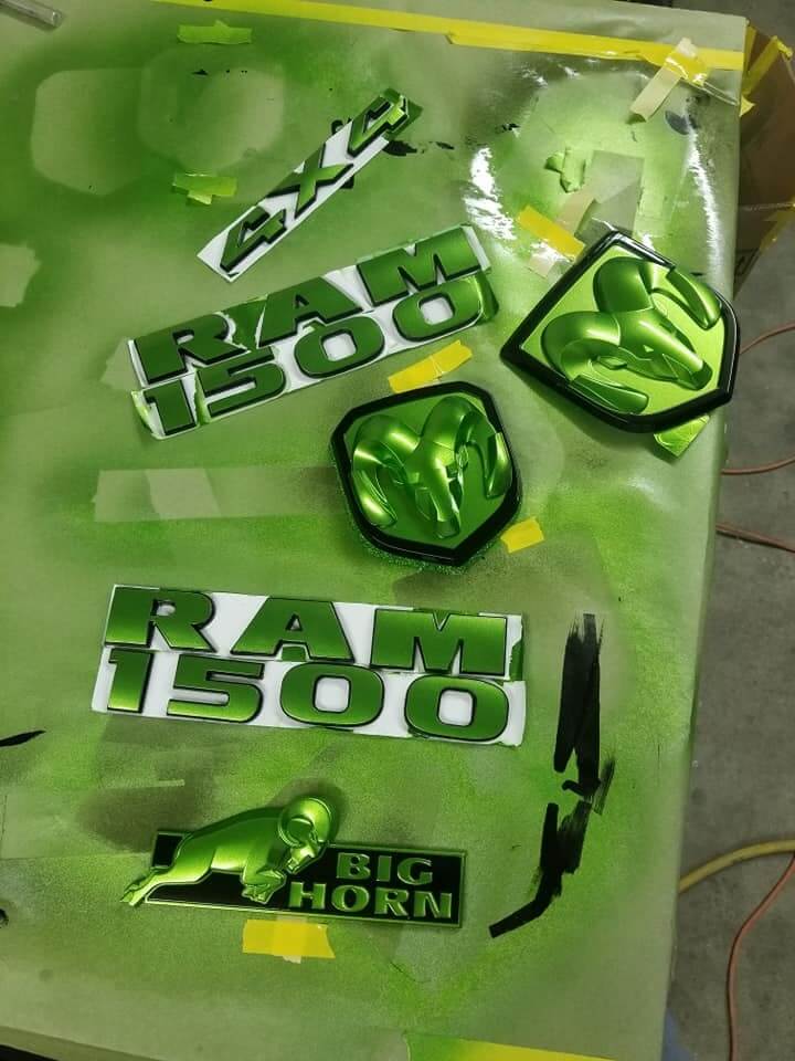 Tamco Paint Drag N Green Metallic on Dodge Ram 1500 Emblems