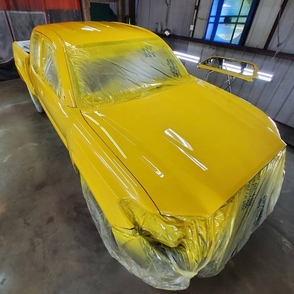 Tamco Paint Bright Yellow in Toyota Tacoma