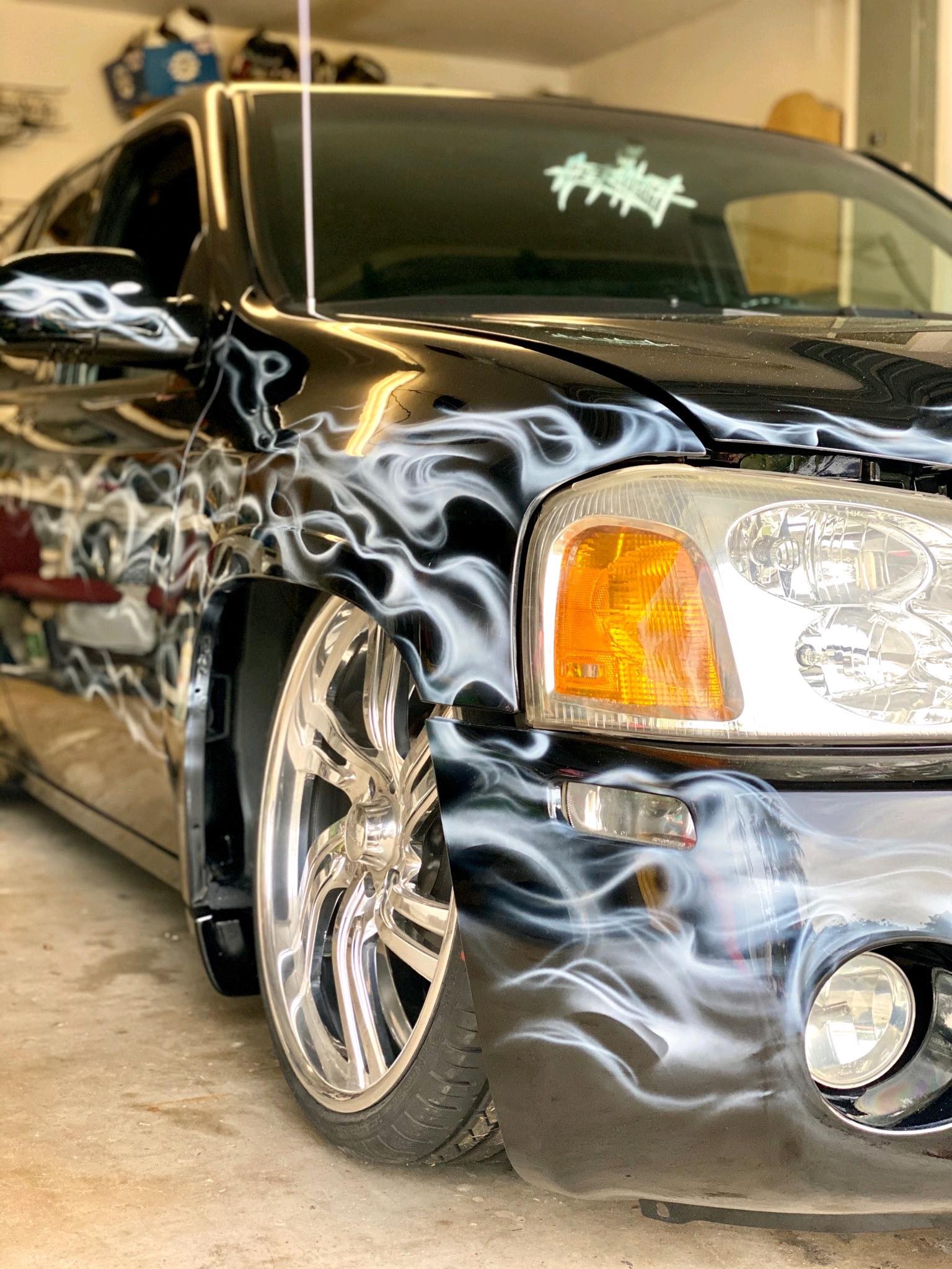Tamco Paint Murdered Out Black & Blizzard of Ozz White Pearl in GMC Envoy