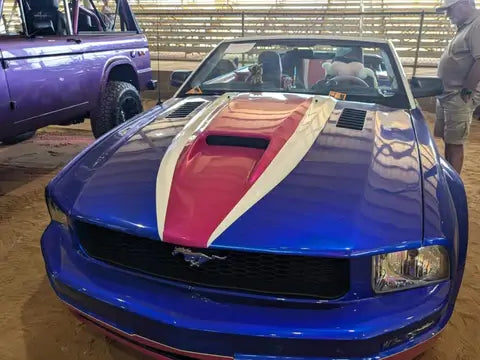 Freedom Blue with the Shade of pink and white ford Mustang