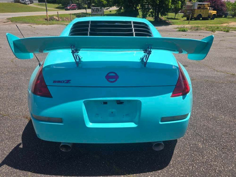 2005 Nissan 350Z  Rockin' Robin  Lipstick Pearl