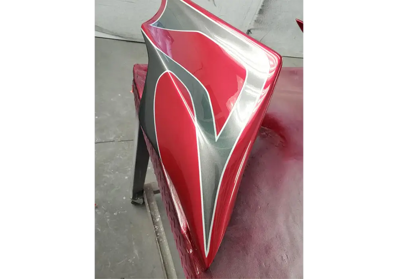 Smoke Metallic with the shade red motor part