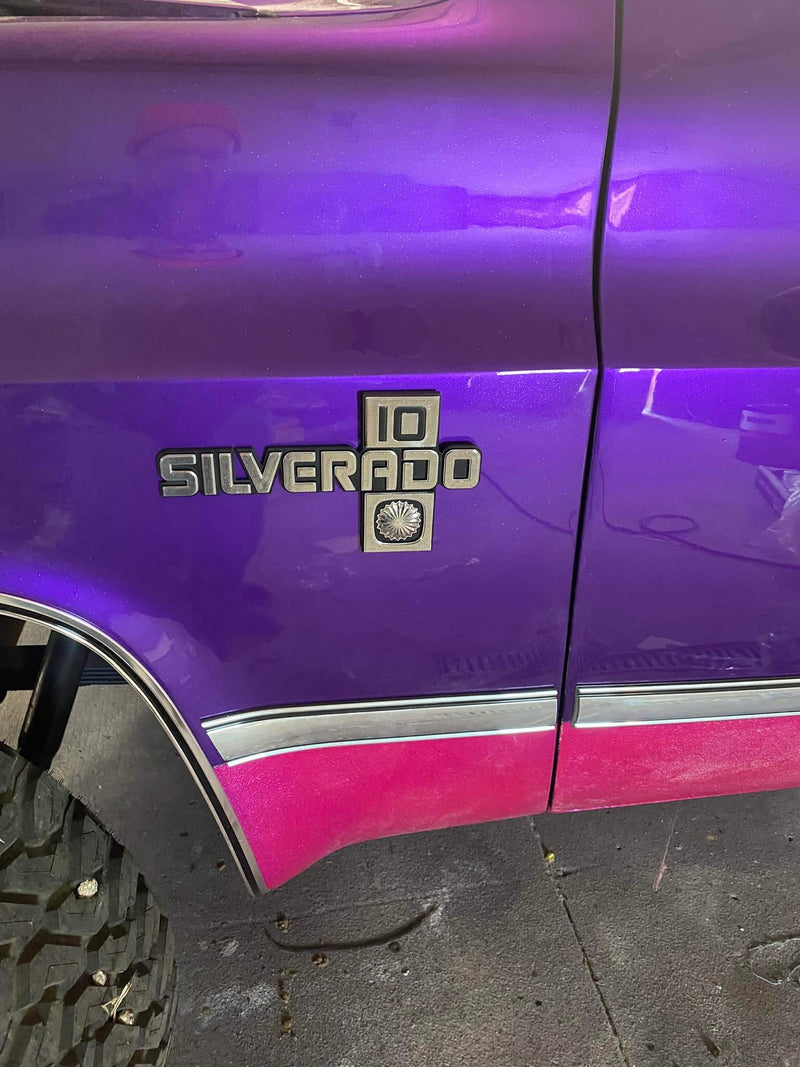 Lipstick with the shade of puple Chevy Silverado