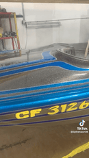 Tamco Paint Slick Silver Metallic and Candy Concentrates on Boat Hull