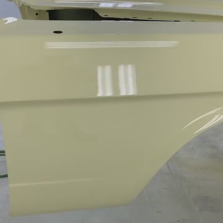 SPRINGTIME YELLOW PARTS OF THE CAR OF  1966 FORD MUSTANG